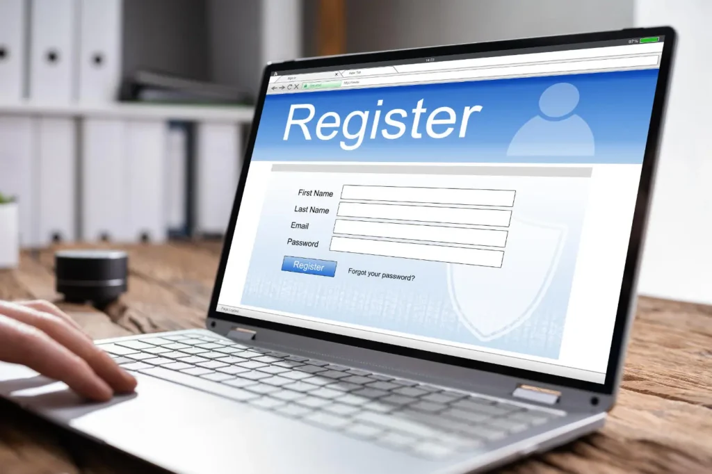 Laptop screen displaying an online registration form, representing VAT registration in Thailand.