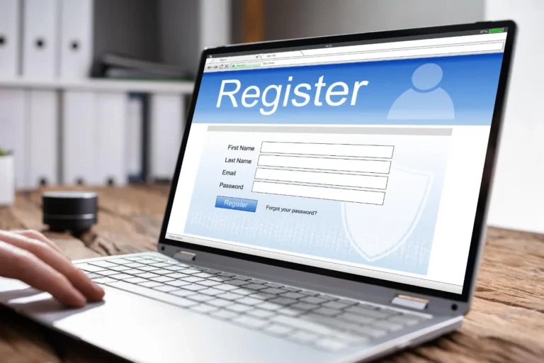 Laptop screen displaying an online registration form, representing VAT registration in Thailand.